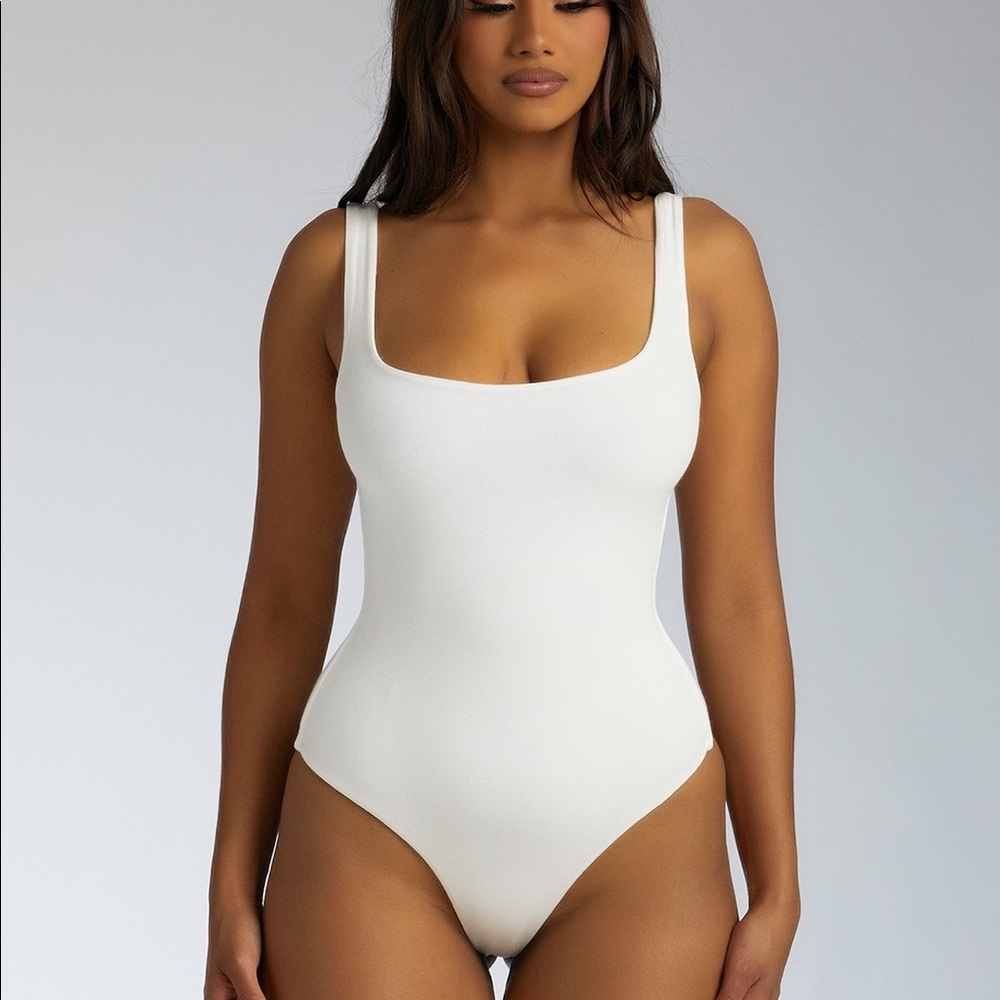 Naked Wardrobe White Bodysuit Tank